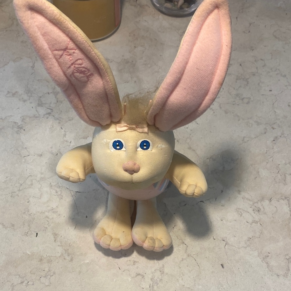 Charming Xavier Robert’s “Bunny Bee” Plush with Pink Ears